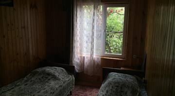 Фото номера Стандартные апартаменты Гостиница Grusheviy Dom г. Лоо 2