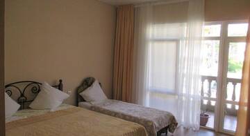 Фото номера Четырехместный номер Гостиница Guest house Kilikiya г. Лоо 6