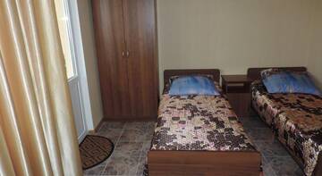 Фото номера Двухместный номер с 2 отдельными кроватями Гостиница U Grishi г. Лоо 2