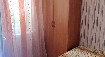 Фото номера Двухместный номер с 1 кроватью и общей ванной комнатой Гостиница У Михалыча г. Лоо 14