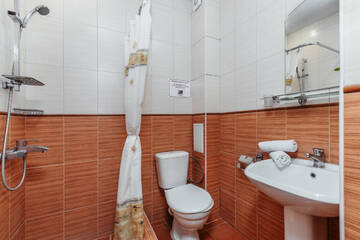 Фото номера Классический трехместный номер Гостевой дом Райский Уголок г. Лоо 14