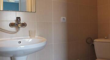 Фото номера Классический трехместный номер Гостиница Guest House Agava г. Лоо 4