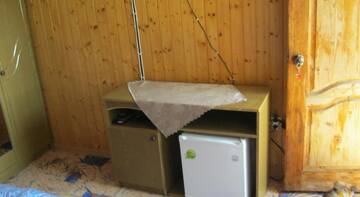 Фото номера Двухместный номер с 1 кроватью и общей ванной комнатой Гостевой дом Dom-cottage na Druzhby г. Лоо 6