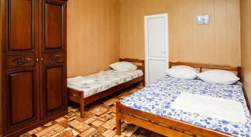 Фото номера Трехместный номер с террасой Гостиница Vesna г. Лоо 7